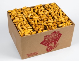 Open cardboard box containing small cheese pretzel nuggets The side of the box has red printed text and a logo.